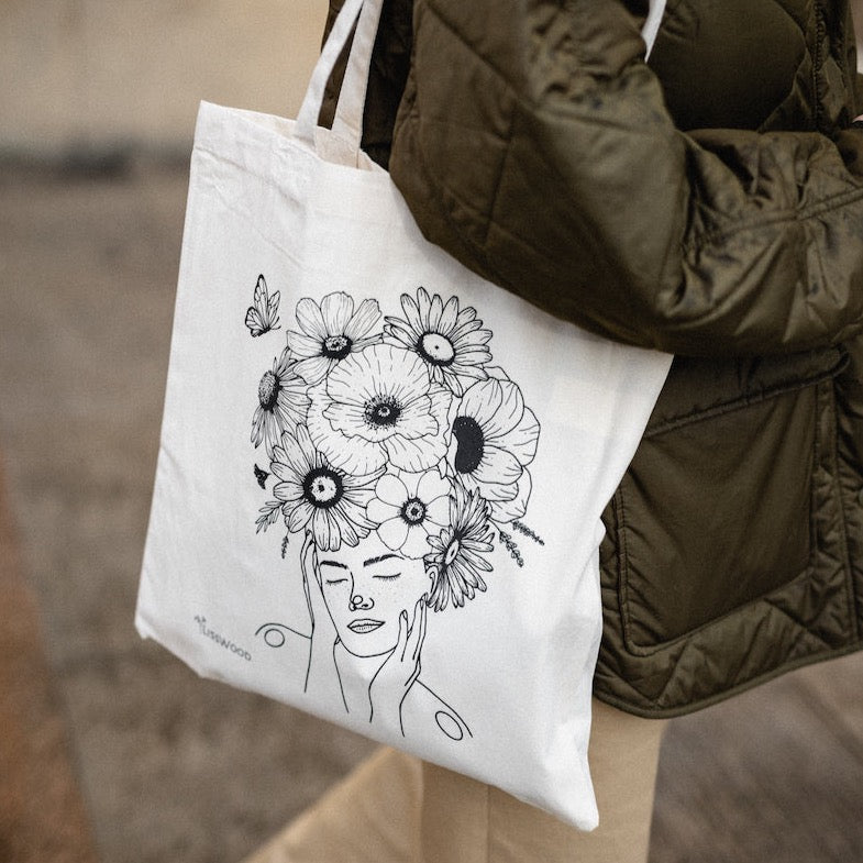 Canvas bag Embraced by butterfly wings