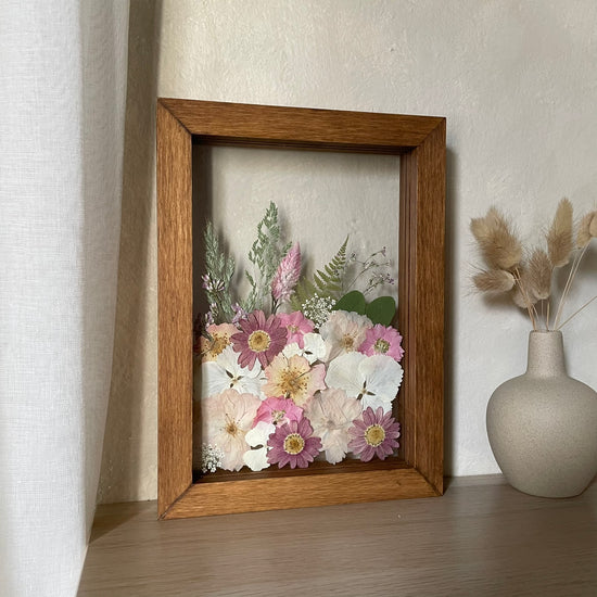 View of a meadow with rose bushes