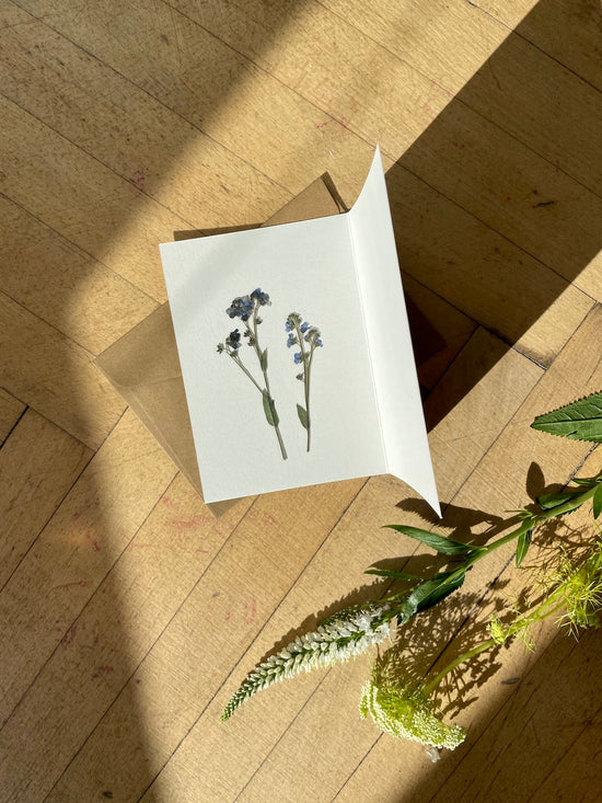 Greeting card with printed forget-me-nots